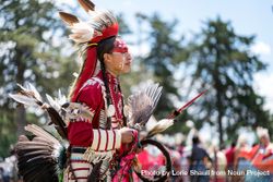 Red Wing, MN, USA - July 8th, 2017: Native American person in headdress at Pow Wow 0L1qr5