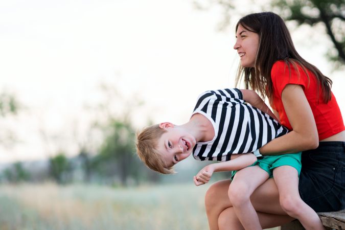 Affectionate mom with son outdoor