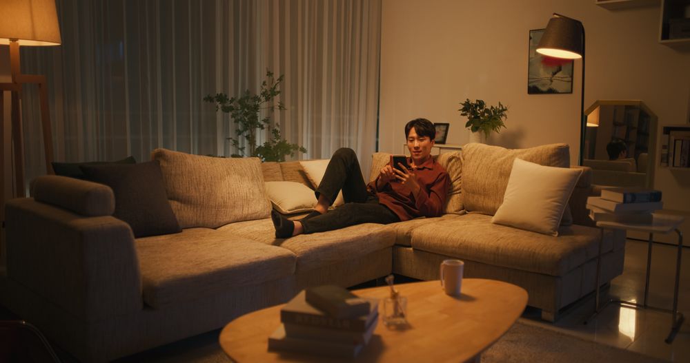 Asian Male Using Productivity Apps, Social Media Network and Personal Development Tools