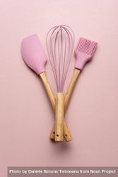 Pink baking utensils on a pink table 4Bgreb