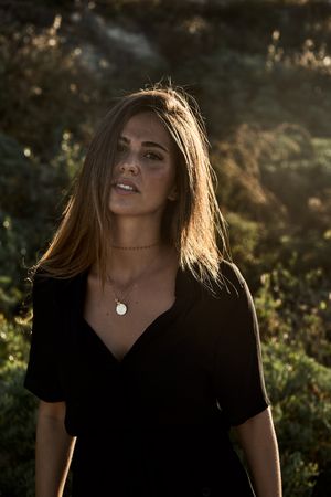 Cheerful woman looking away
