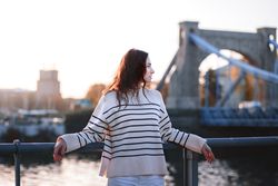 Young woman on bridge