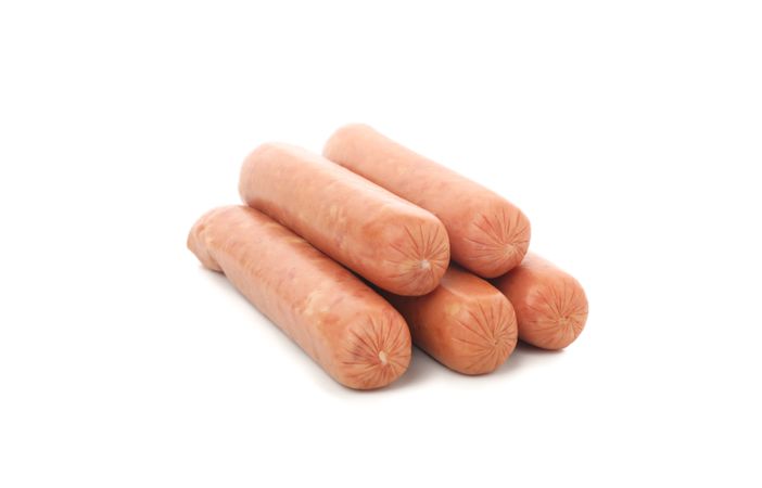Five sausages in blank room
