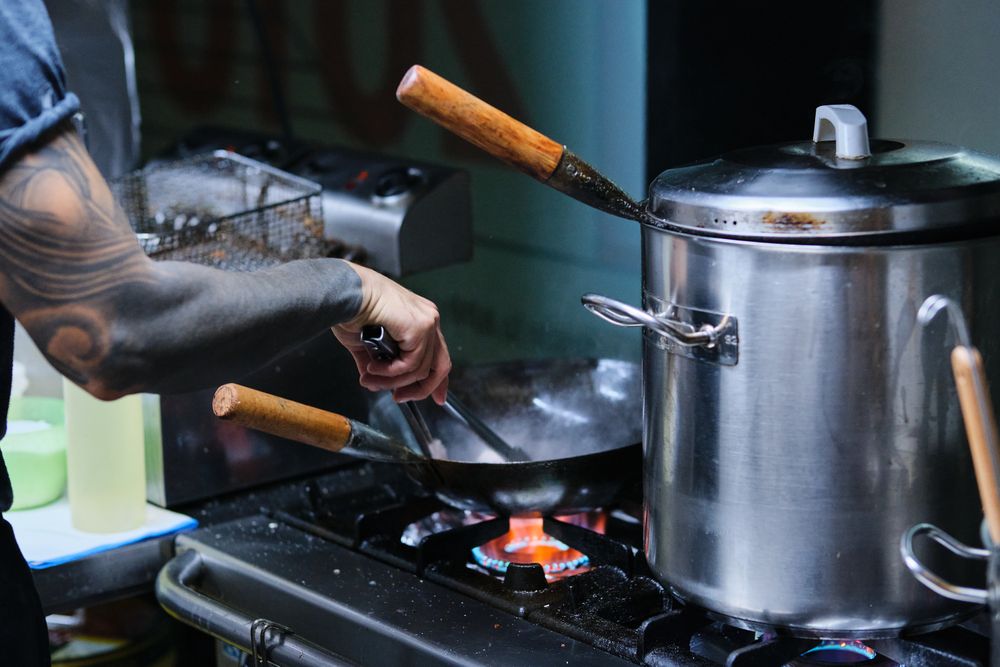 Chef Cooking in Japanese Restaurant
