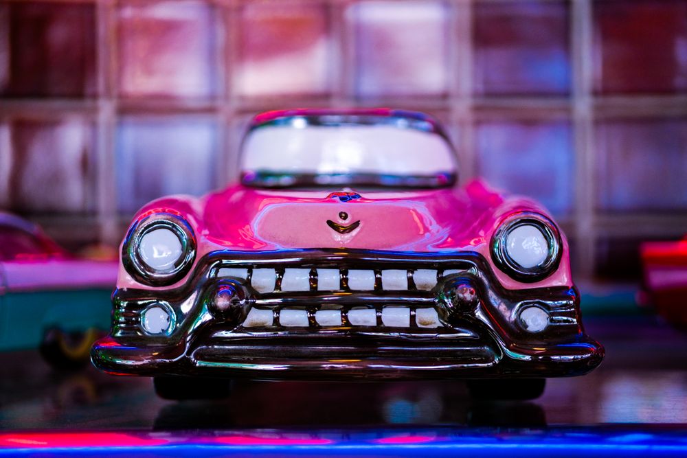 A model car sitting on a shelf