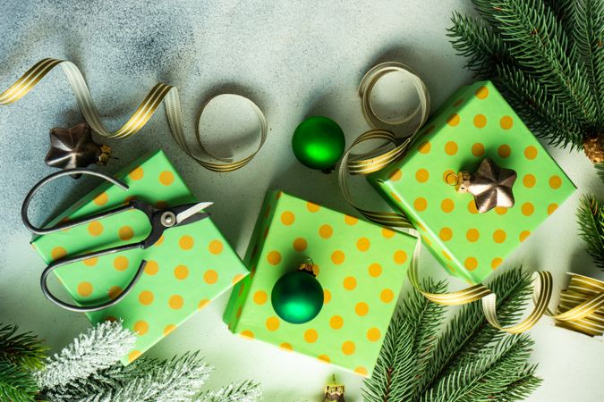 Top view of three vibrant green Christmas presents