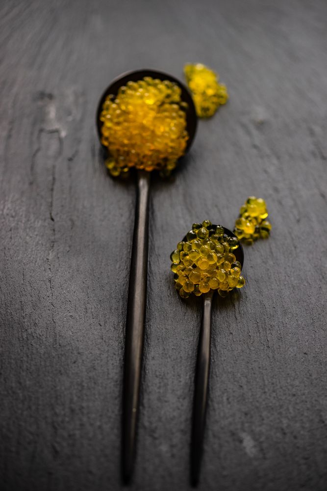 Yellow trout caviar on spoons