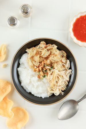 Top View Bubur Ayam or Chicken Porridge, Indonesian Traditional Food