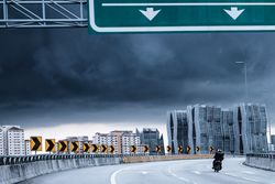 Person on motorcycle on highway