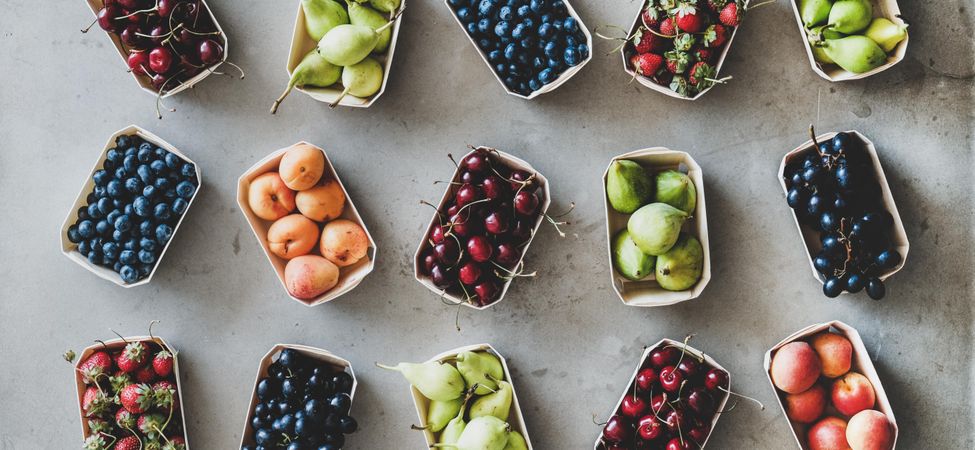 Fresh fruit arranged in eco-friendly boxed