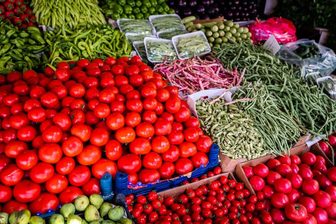 Assorted tomato and chili peppers and other vegetables in a market store
