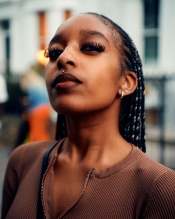 London, England, United Kingdom - August 28, 2022: Portrait of Black woman in brown shirt