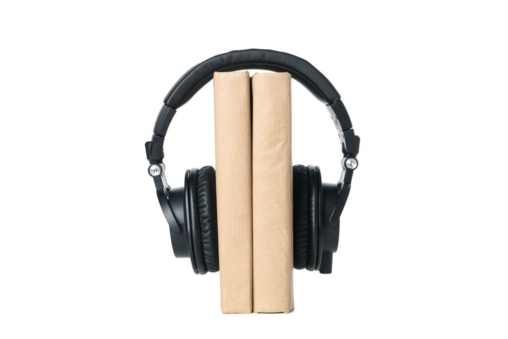 Concept of audiobook, isolated on light background