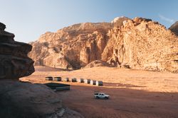 Pickup truck near camp in desert