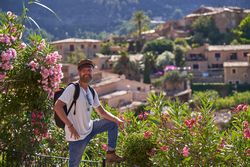Cheerful traveler admiring old town