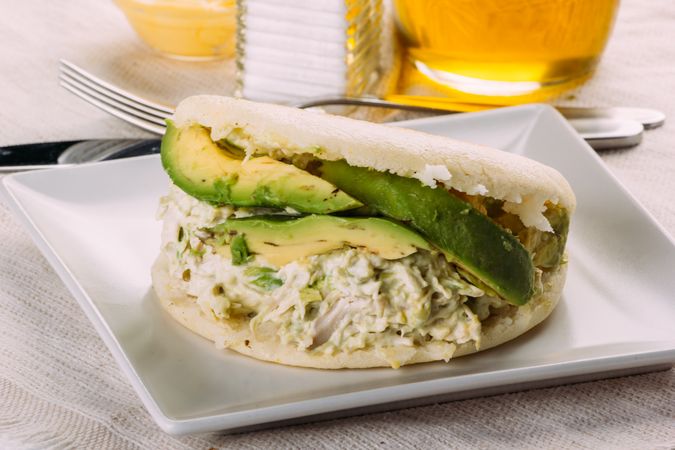 Famous Venezuelan arepa called queen pepeada, has avocado and chicken