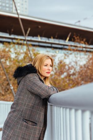 Blonde woman posing in the city