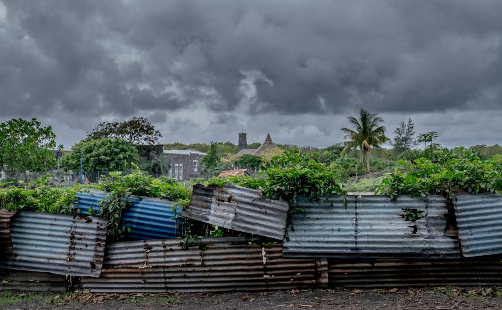 Metal barricade on cloudy day