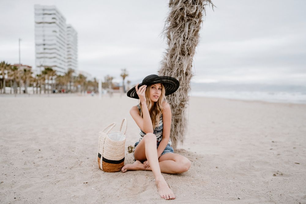 Young female relaxing on beach