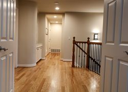 Completion of new hardwood floors installed in home