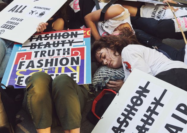 London, England, United Kingdom - September 15th,2019: Protesters lying huddled together with signs