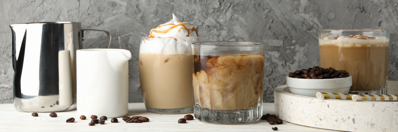 Composition with ice coffee on wooden background