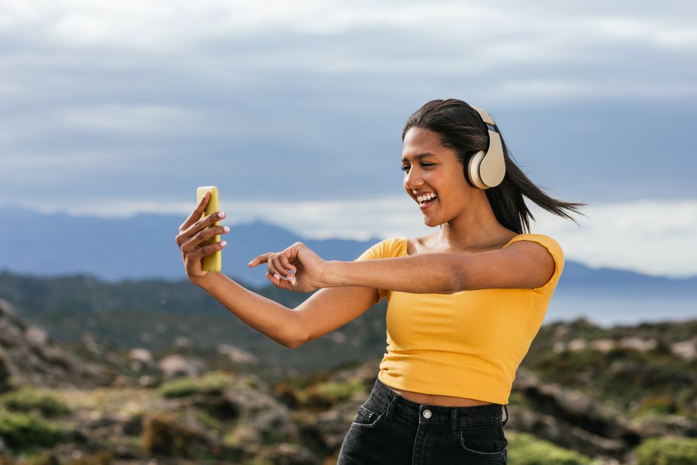 Smiling woman taking selfie