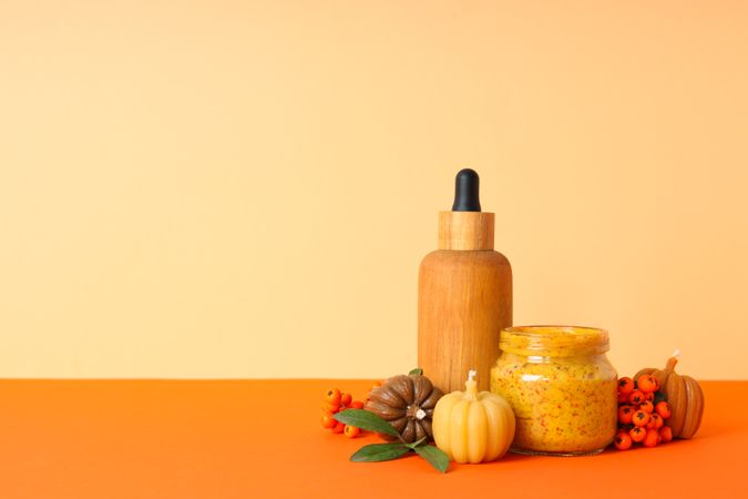 Concept of different cosmetic products, Pumpkin cosmetics, space for text