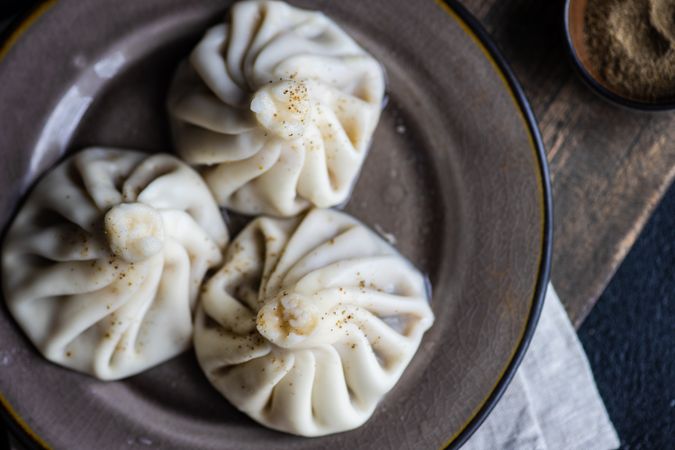 Traditional georgian khinkali dish on stone background