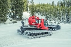 Tracked snow groomer machine