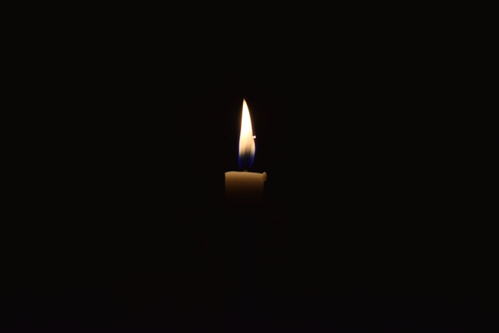 Candlelight burning in the dark