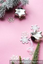 Silver star Christmas decorations and snowflakes on pink background with copy space bGdzX0