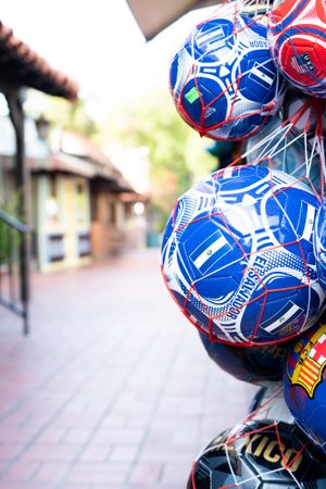Soccer balls for sale at market
