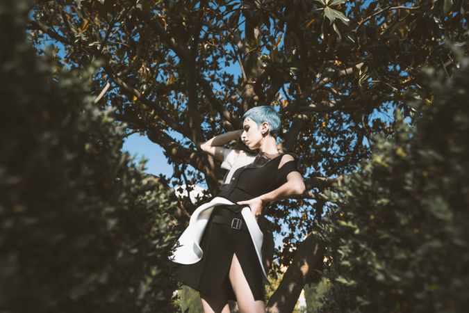 Informal young under tree in sunlight