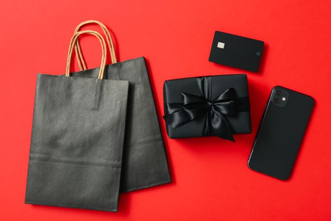 Sale concept with gift box on red background