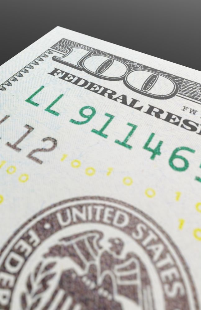 One Hundred Dollar Bills Close-up Abstact.