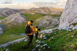 mountaineers hiking on a mountain peak