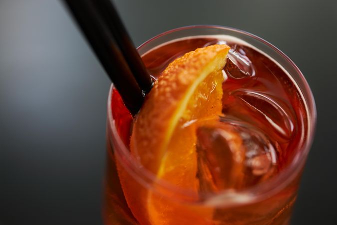 Close up of cocktail with orange slice