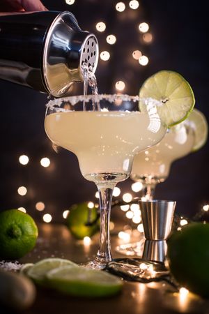 Preparing a margarita cocktail
