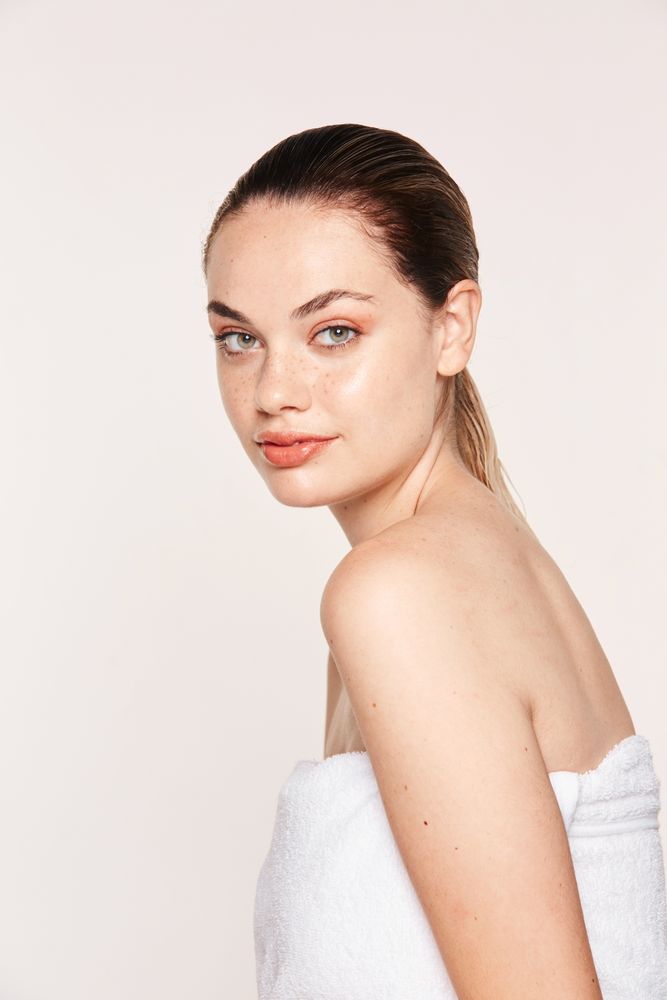 female demonstrating natural beauty