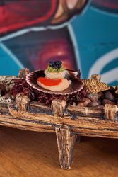 Seafood on decorative wooden boat