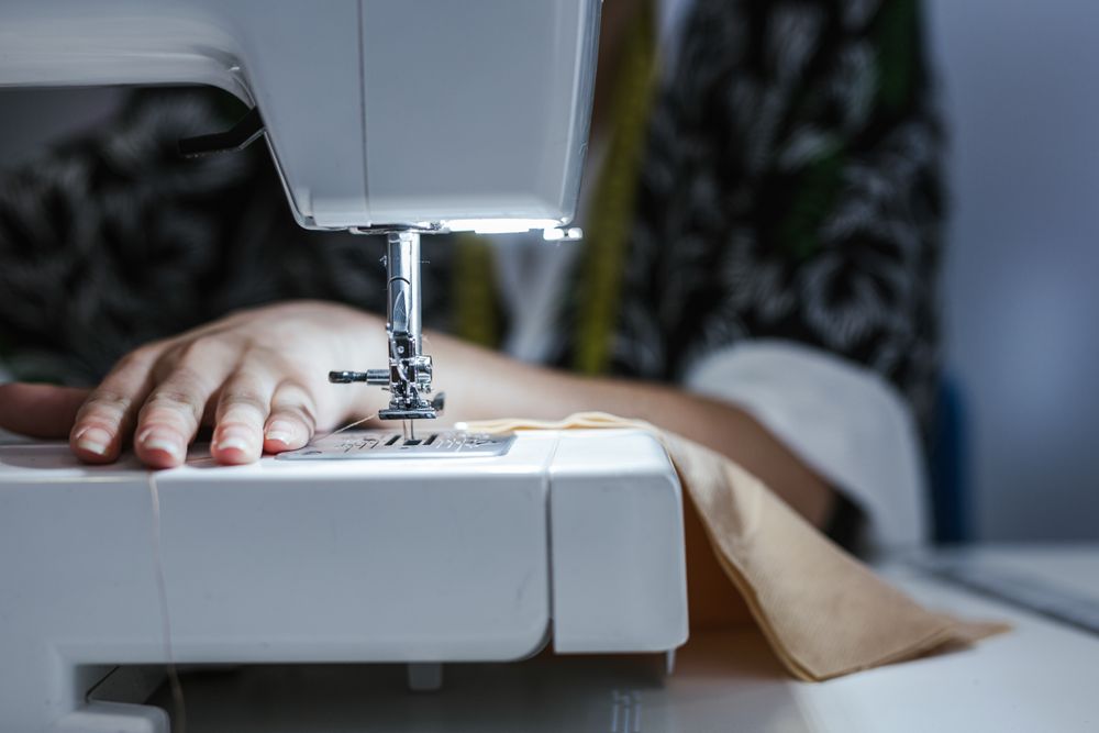 Woman in a sewing school