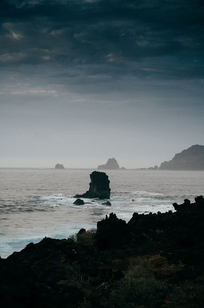 Boulder in ocean as seen from El Hierro, Canary Islands, vertical