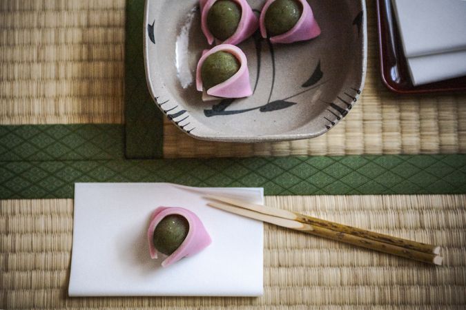 Japanese pastry and chopsticks on a a table