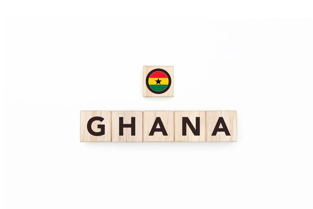 Wooden blocks bearing the name and flag of Ghana.