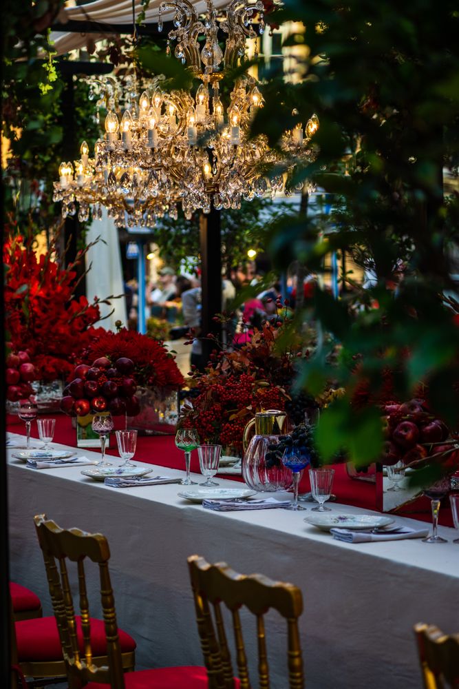 Elegant formal dinner table with autumn colors and chandelier