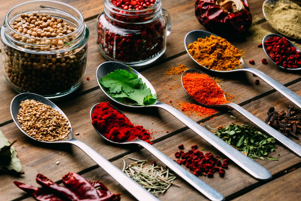 Set of various spices on table