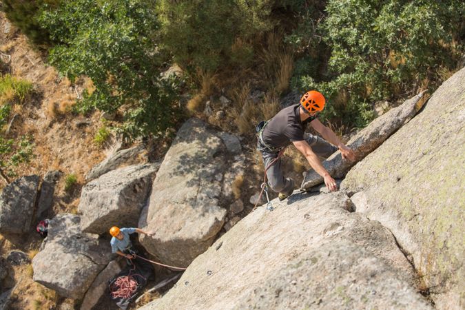 Man climbing a rock