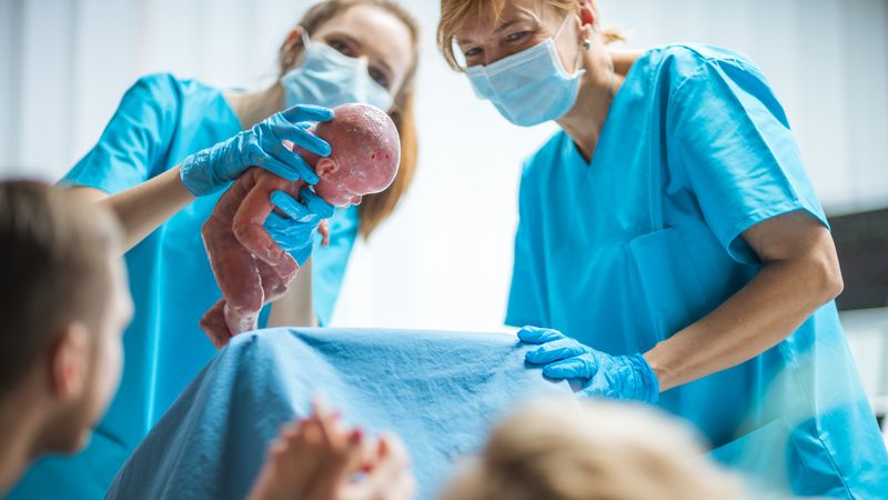 In the Hospital Woman in Labor Gives Birth, Baby