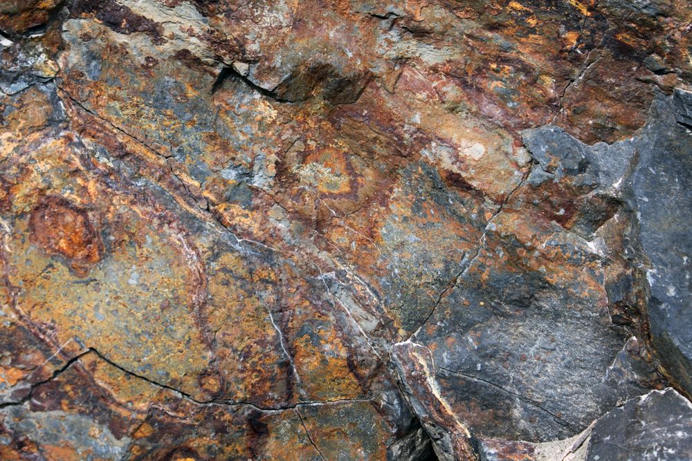 Brown and yellow tones on rock face